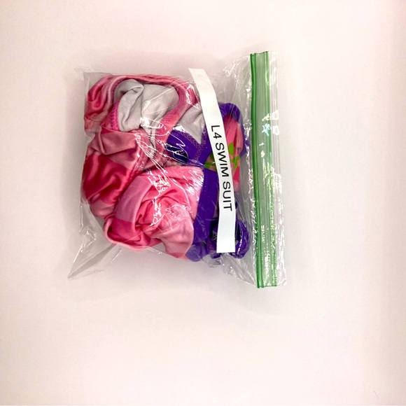 Nice troll swimsuit straps are a little damaged - Picture 3 of 5